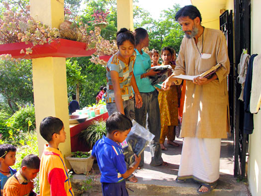 Each child receives an article of clothing